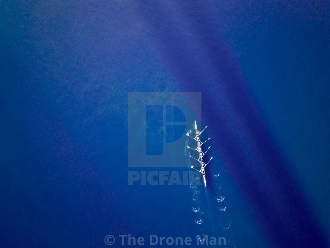 "Teamwork: Aerial rowing boat" stock image