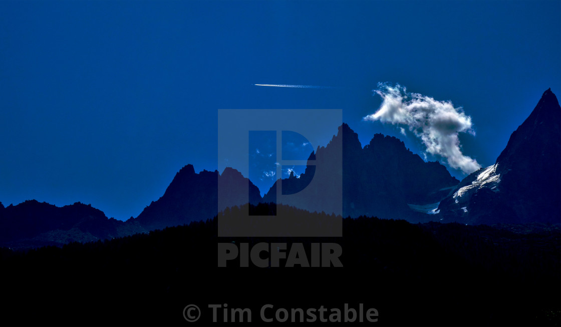 "Night flight over the Alps" stock image