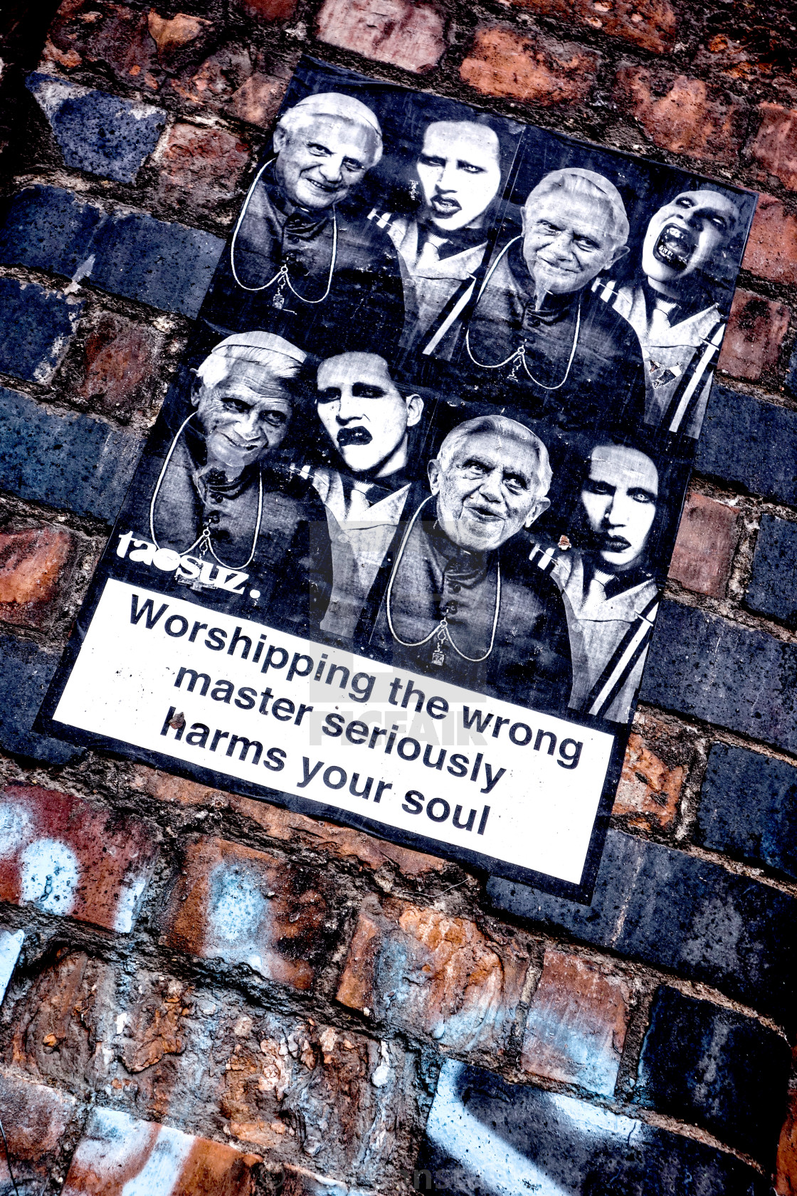 "Worshipping the wrong master!" stock image