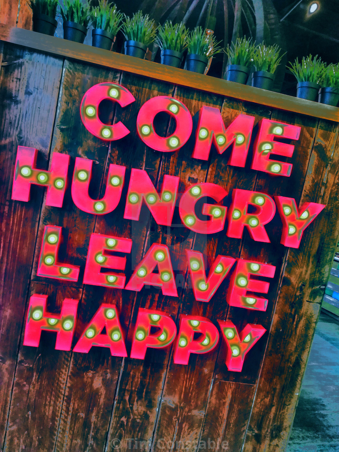 "Come hungry, leave happy" stock image