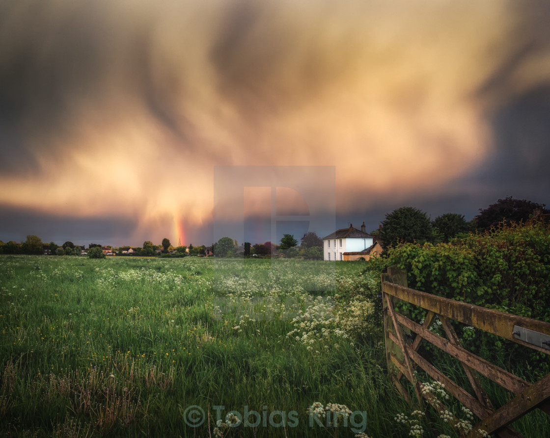 "Rainbow On A Stormy Evening" stock image