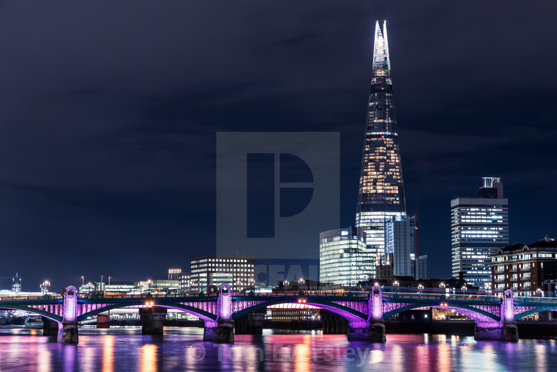 "Modern London city skyline on River Thames with shard building" by Tom Eversley - $15.41 "Modern London city skyline on River Thames with shard building" stock image