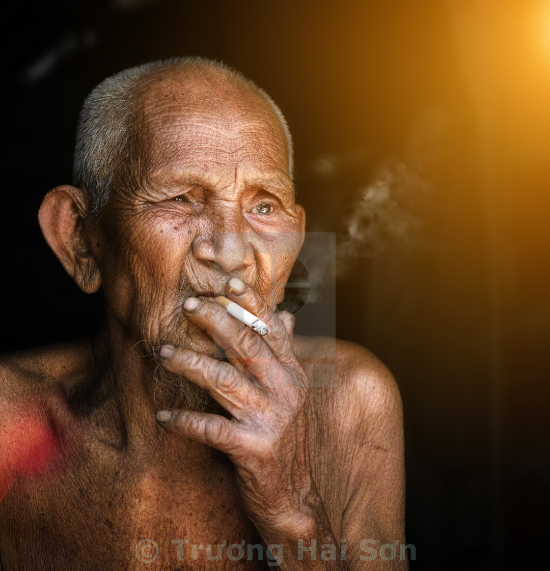 "The old man was smoking" stock image