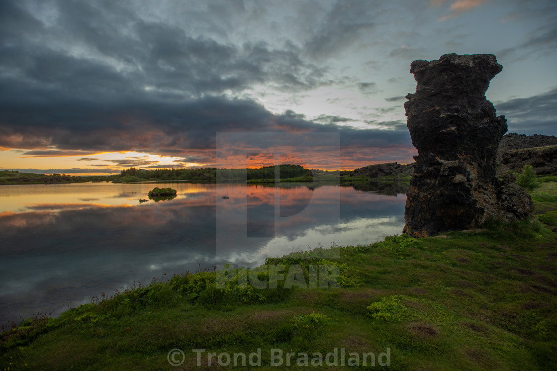 "Sunset over lava pillar at lake Myvatn" stock image