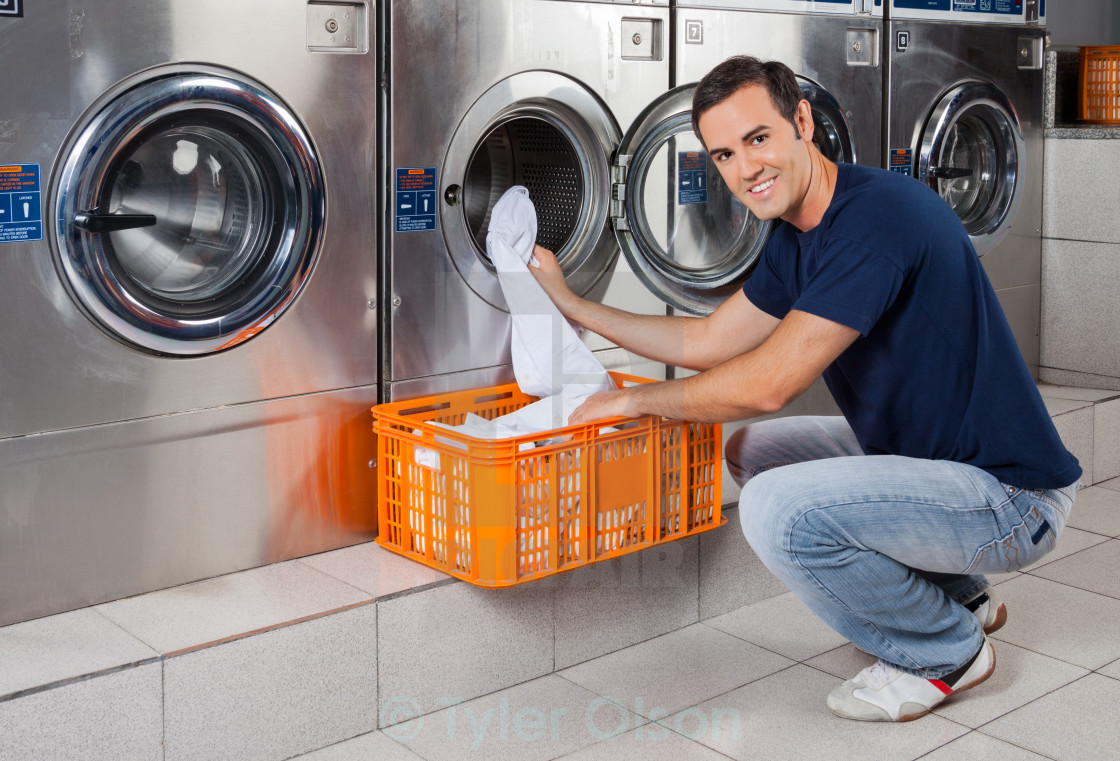 Young Man Putting Clothes In Washing Machine License Download Or Print For 12 40 Photos Picfair Sort your clothes into piles. https www picfair com pics 01204157 young man putting clothes in washing machine