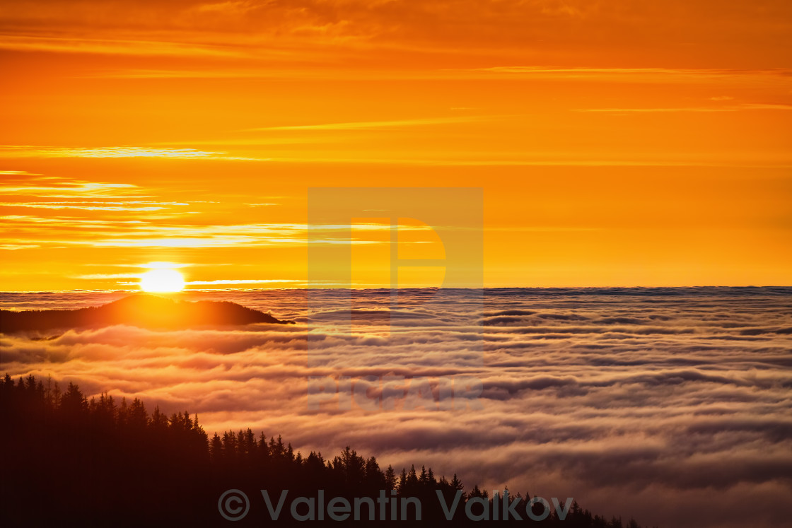 "Aerial view of Sunrise over mountain and fog" stock image