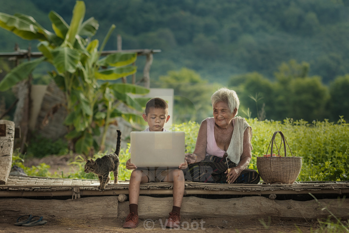 "Country boy with gadgets in the field." stock image