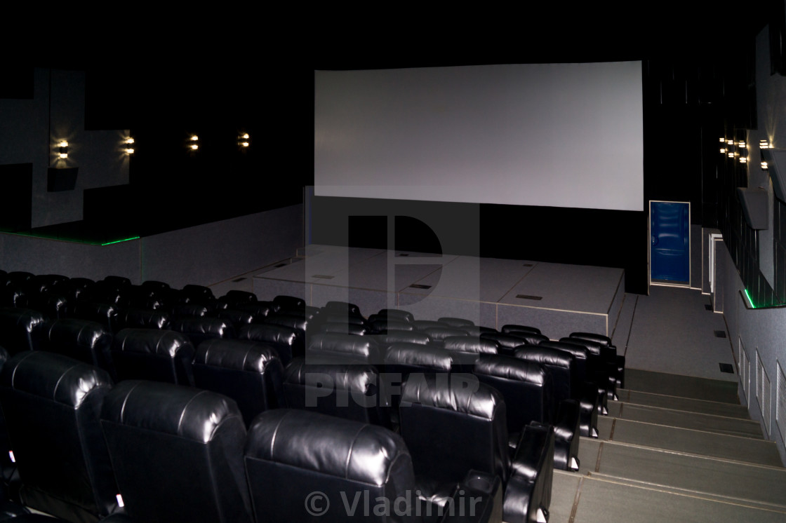The Interior Of A Cinema Hall With Black Leather Seats And A Whi License Download Or Print For 1 24 Photos Picfair Top websites to download latest movies online for free.