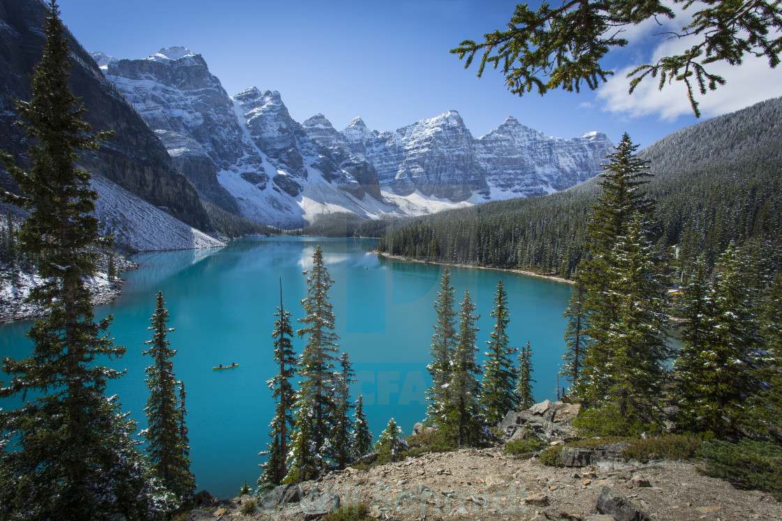 "Moraine Lake with Canoe in Banff National Park" stock image