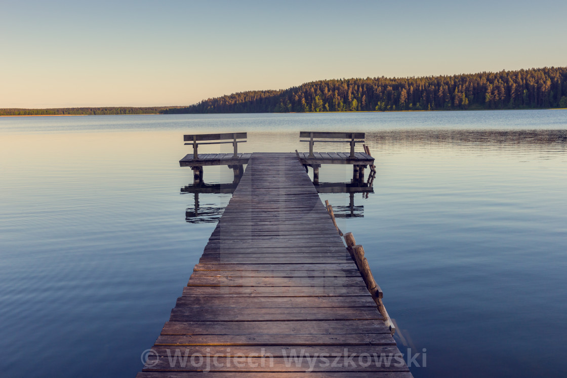 "Wooden footbridge on the lake" stock image