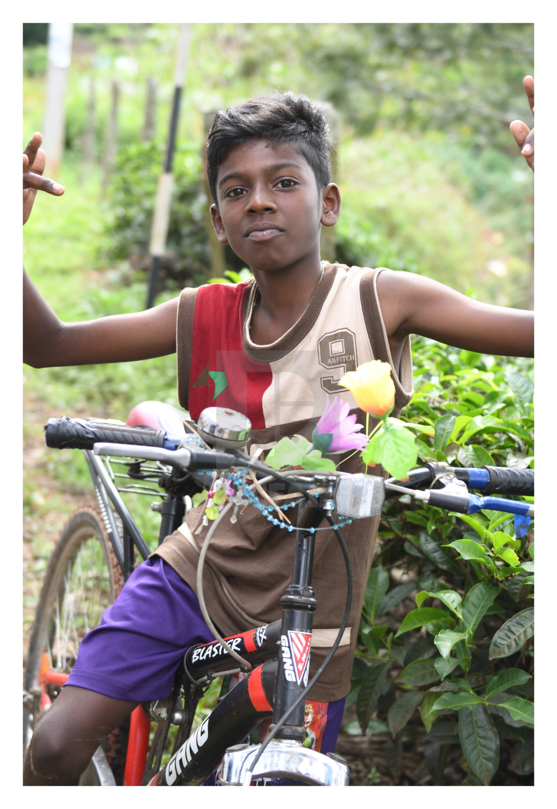 "India boy on his bike" stock image. 