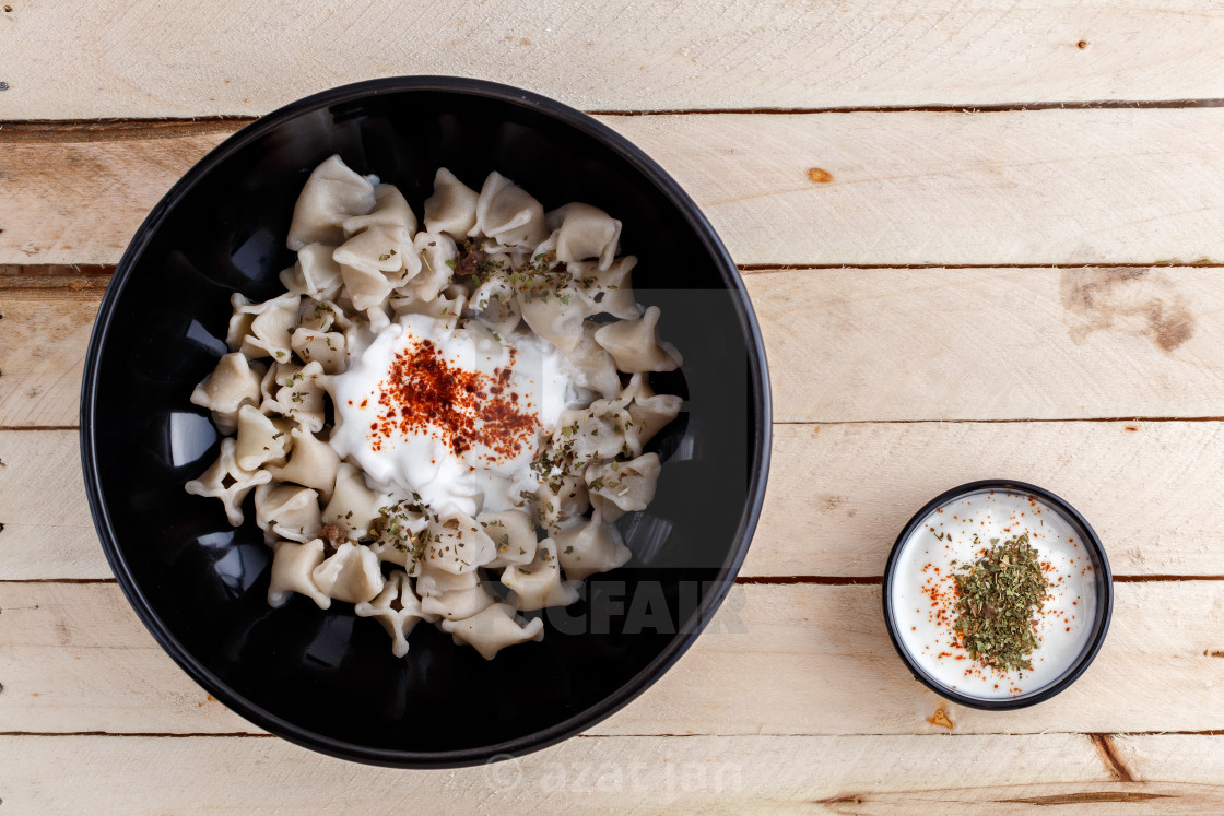 Turkish Manti Manlama On Plate With Red Pepper Tomatoes Sauce License Download Or Print For 6 20 Photos Picfair