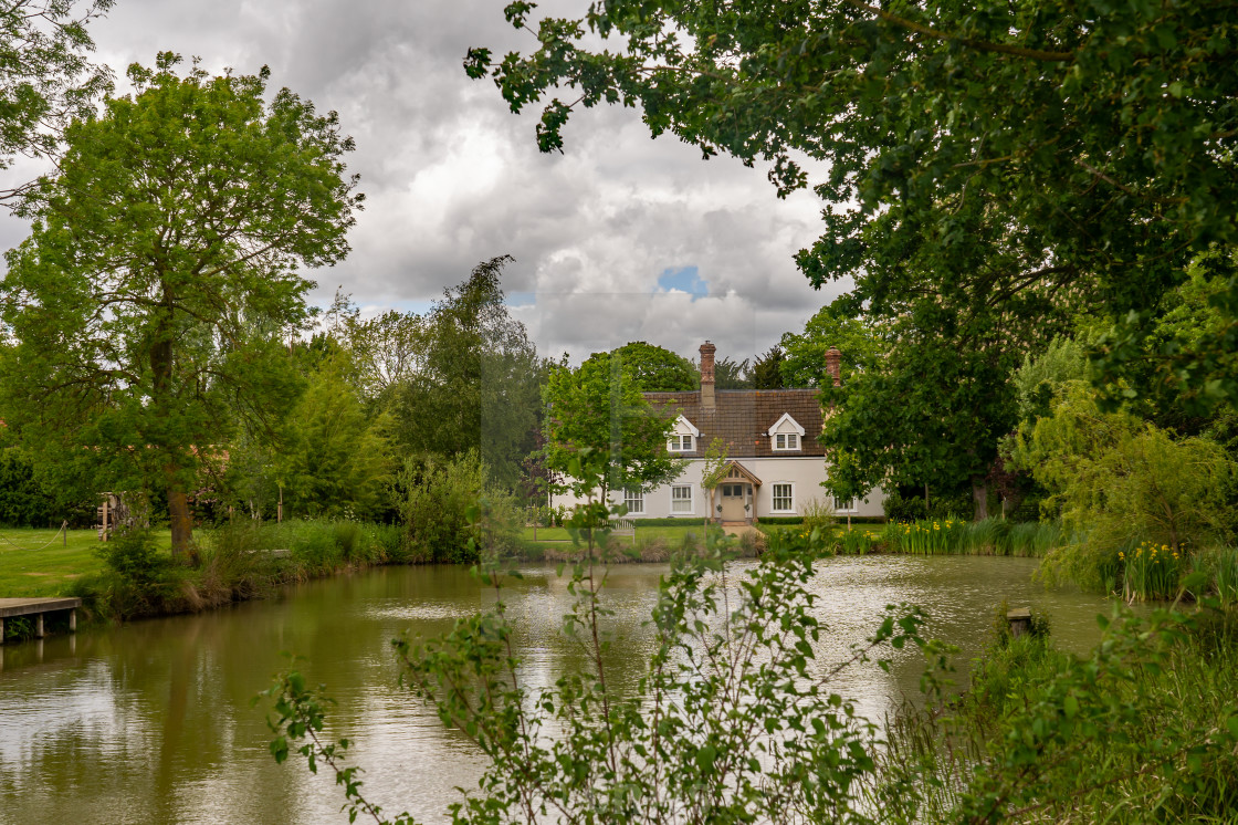 Traditional Cottage With Its Own Outdoor Lake In The Remote Countryside Of Norfolk Uk May 19 License Download Or Print For 2 48 Photos Picfair