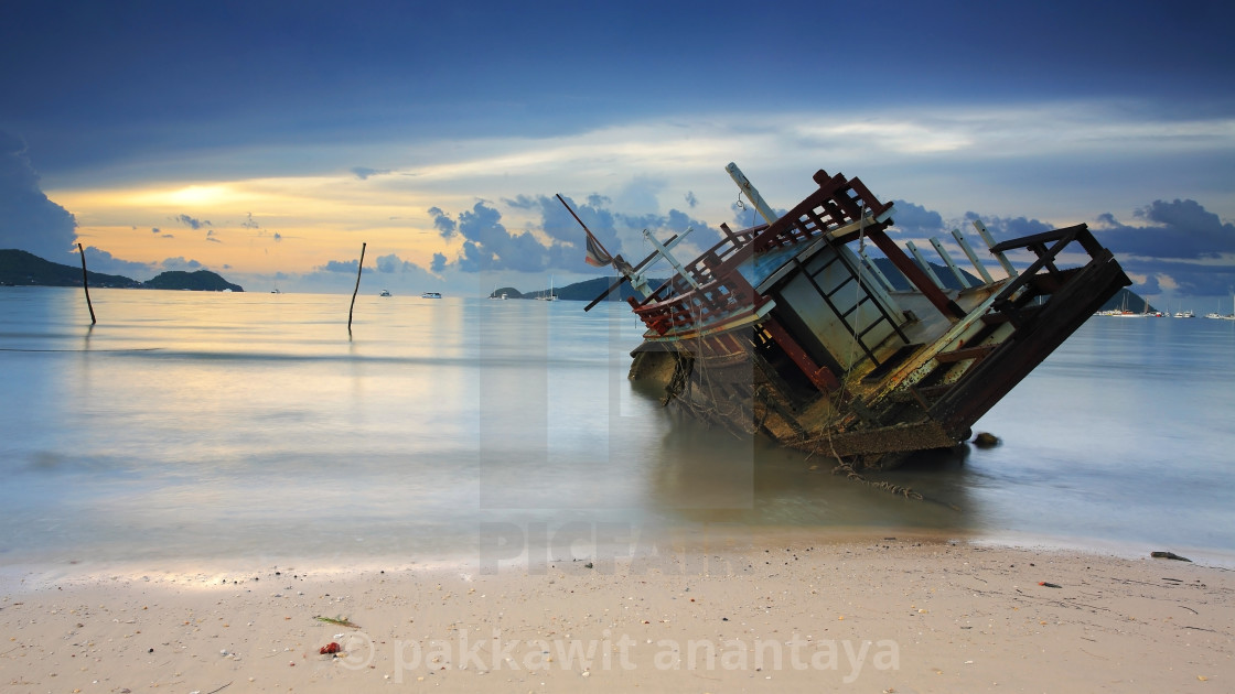 "Seascape with Wreck ship at sunrise" stock image