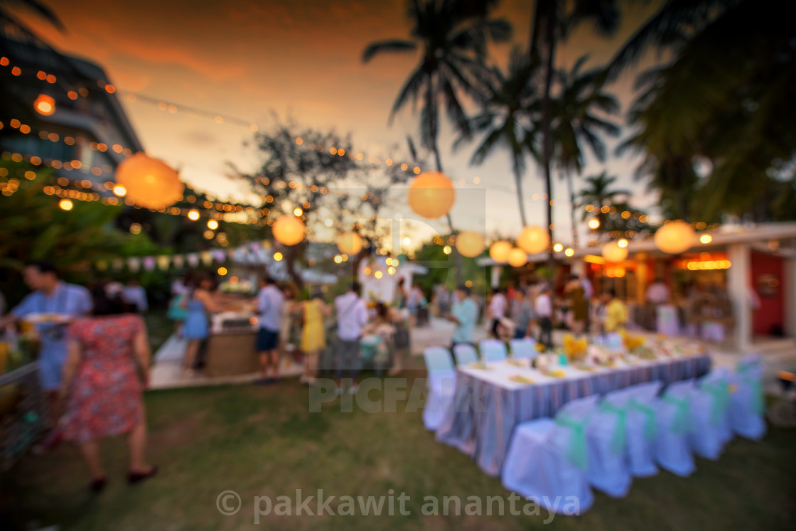 Blur background of outdoor wedding at dusk - License, download or print for  £ | Photos | Picfair