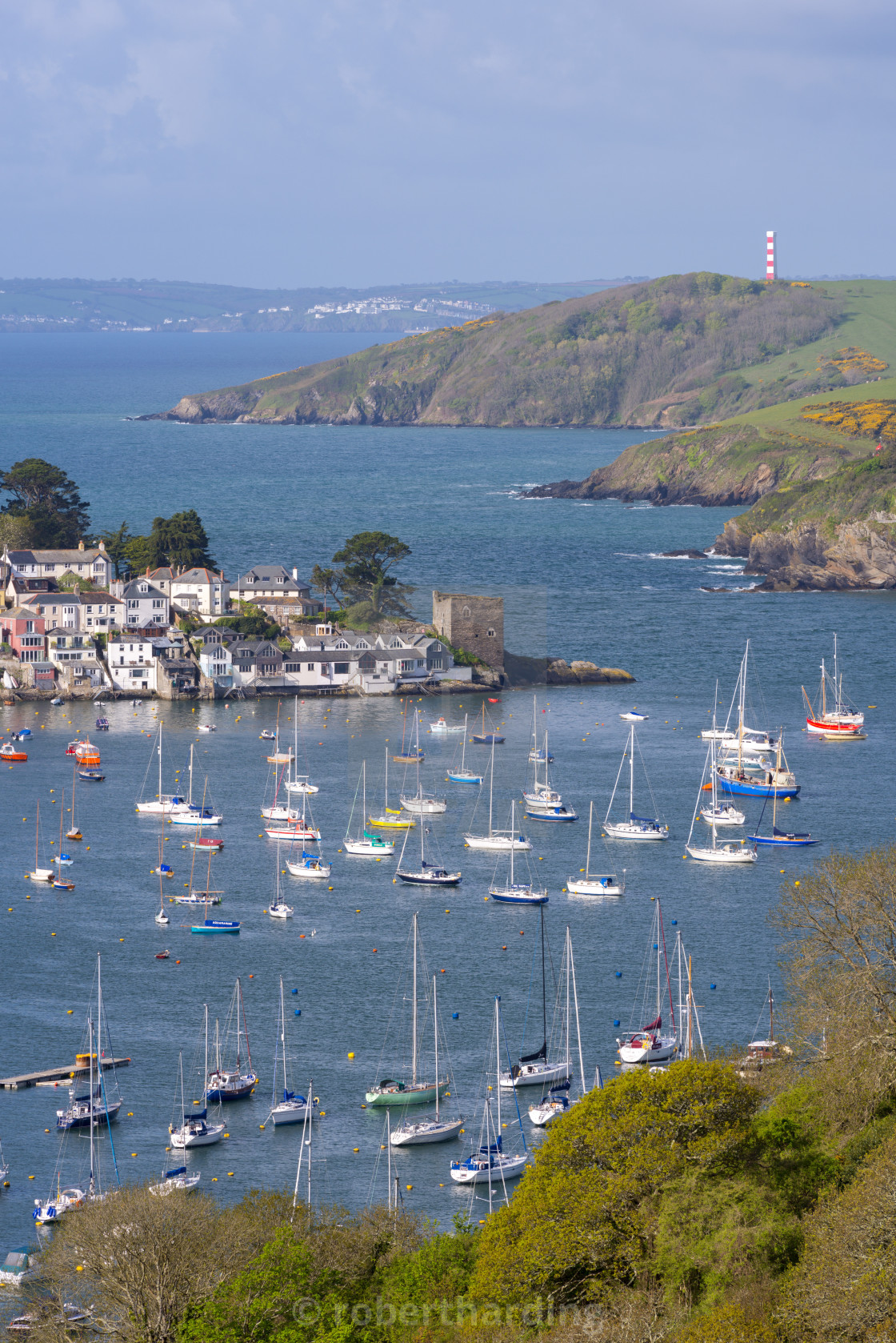 Boats Moored In The Sheltered Waters Of Fowey Estuary Near Polruan