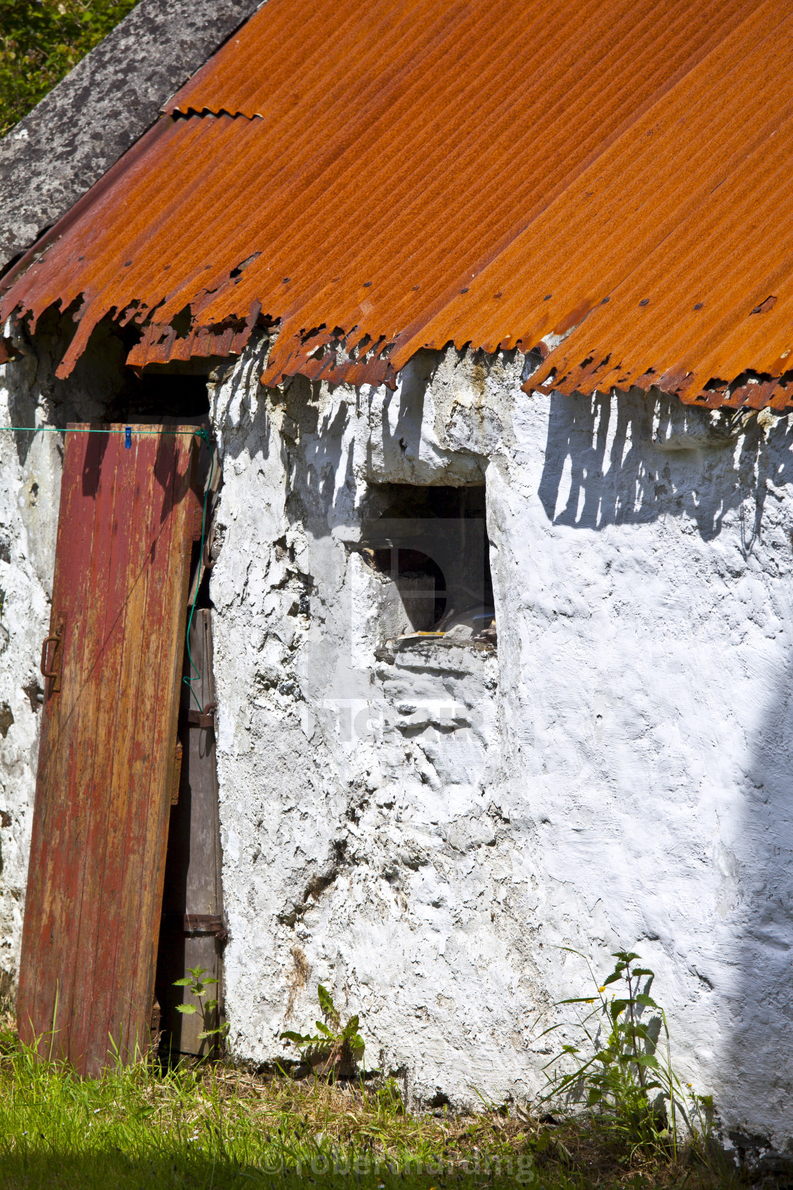 Whitewashed Barn With Rusty Corrugated Iron Roof In County Cork