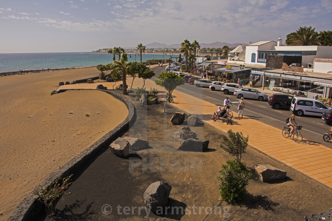 "los pocillos beach and shops" stock image