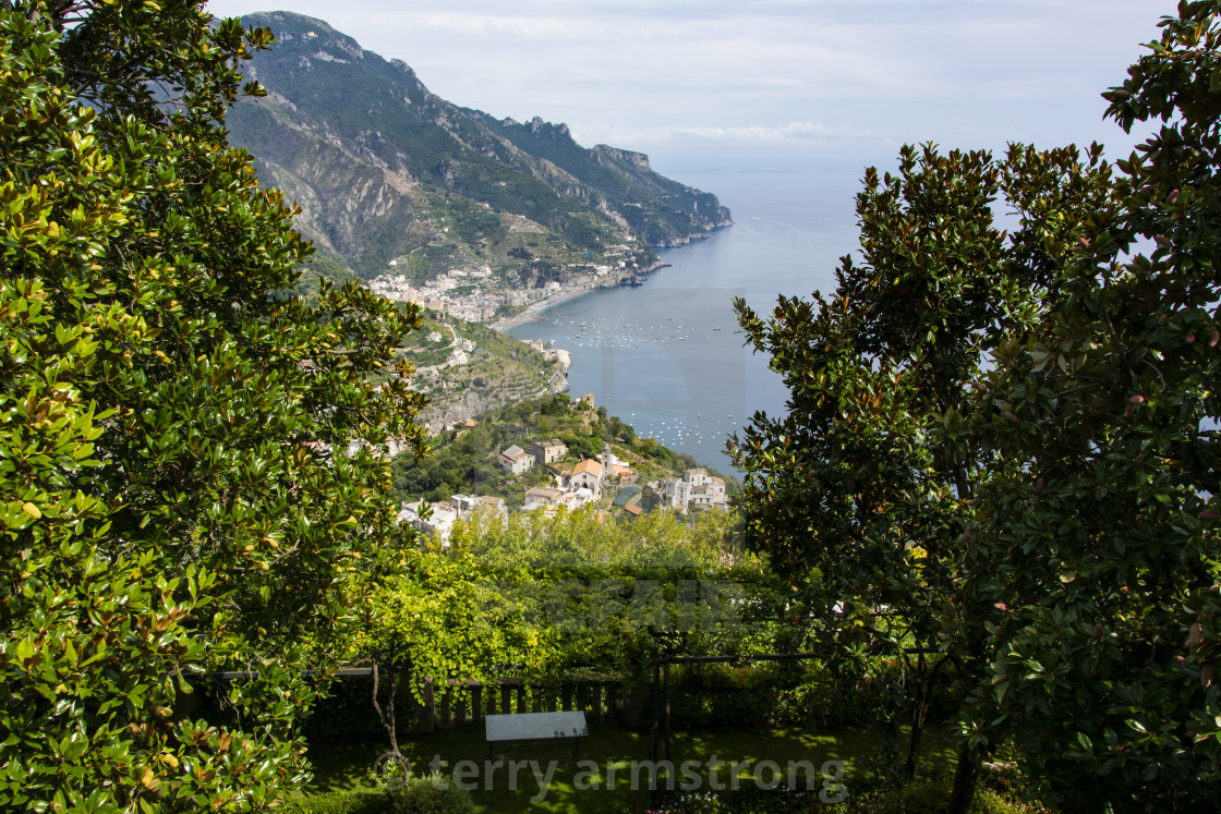 "a view of the amalfi coast through the trees from ravello" stock image