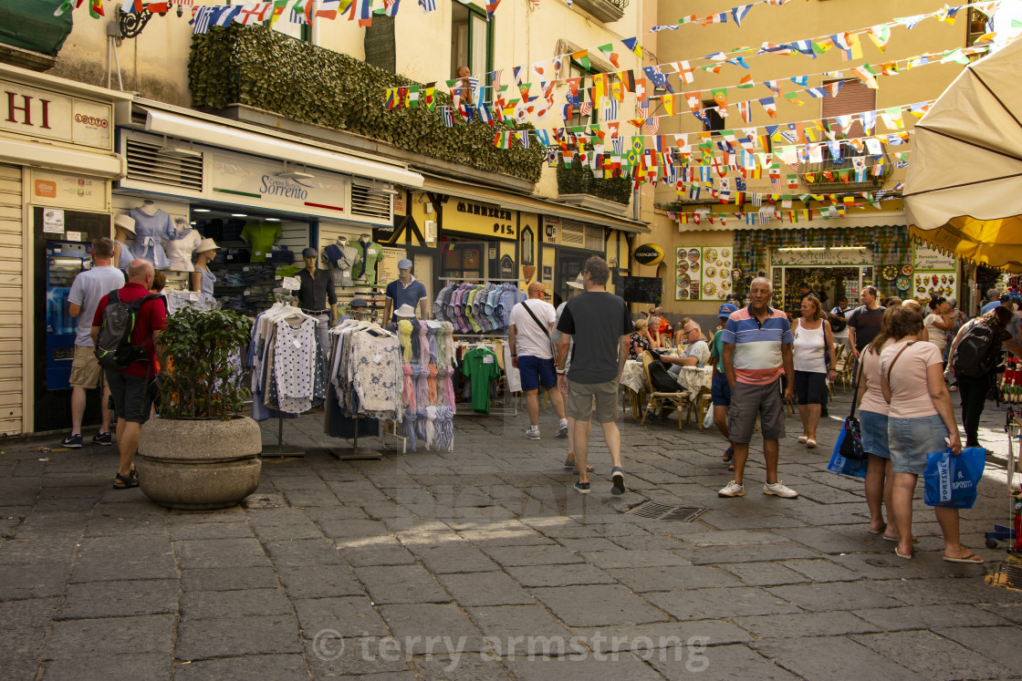 "tourists at the shops" stock image