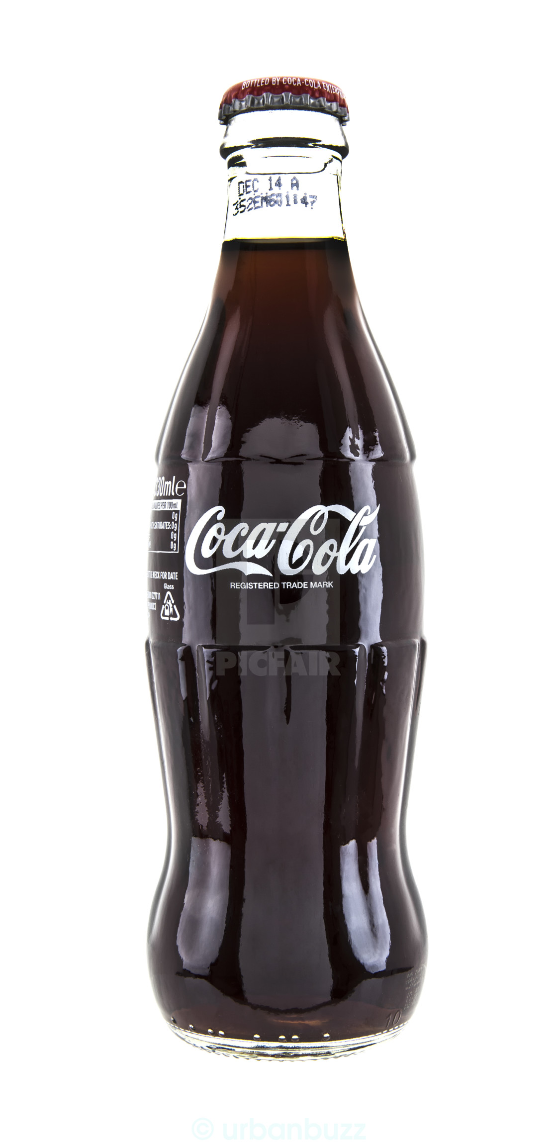 Cassic Coca-Cola Bottle on White Background - License, download or print  for £ | Photos | Picfair