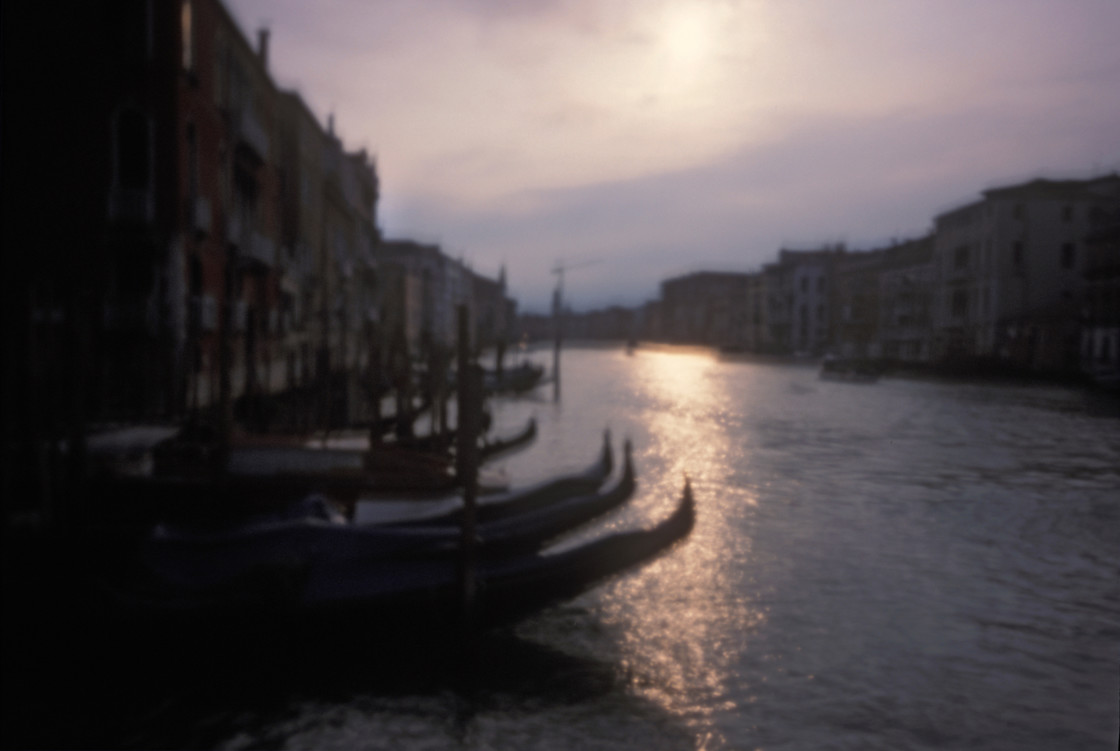 "Sunset in Venice with gondolas" stock image