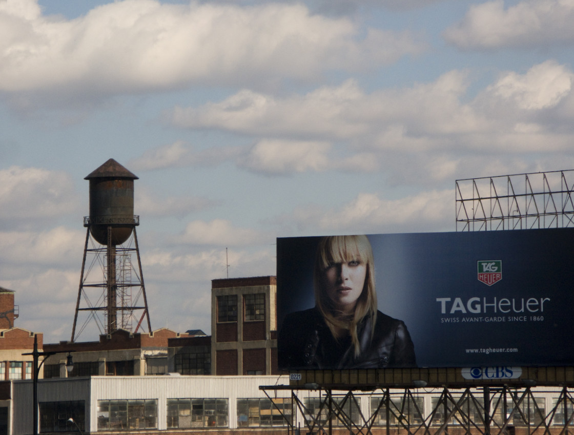 "View of New York with water tank and billboard" stock image