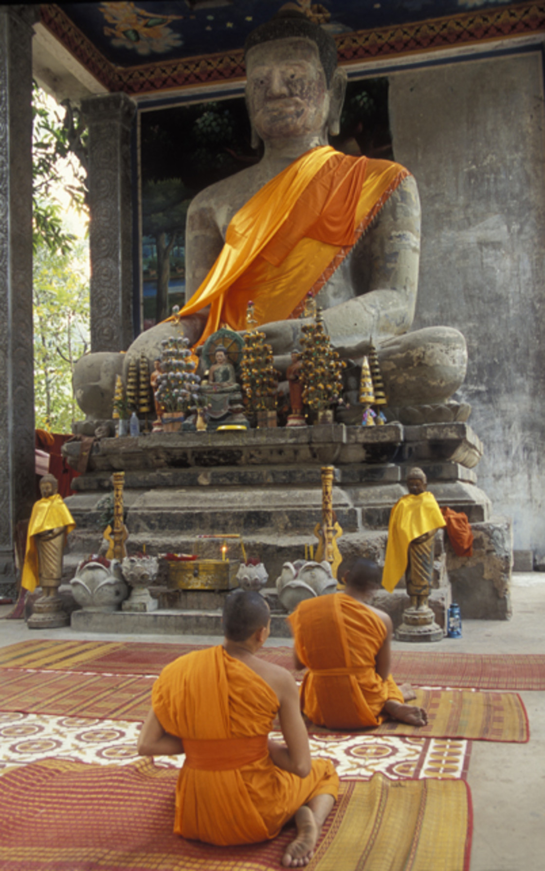 "Monks praying, Angkor Thom, Bayon, Cambodia" stock image