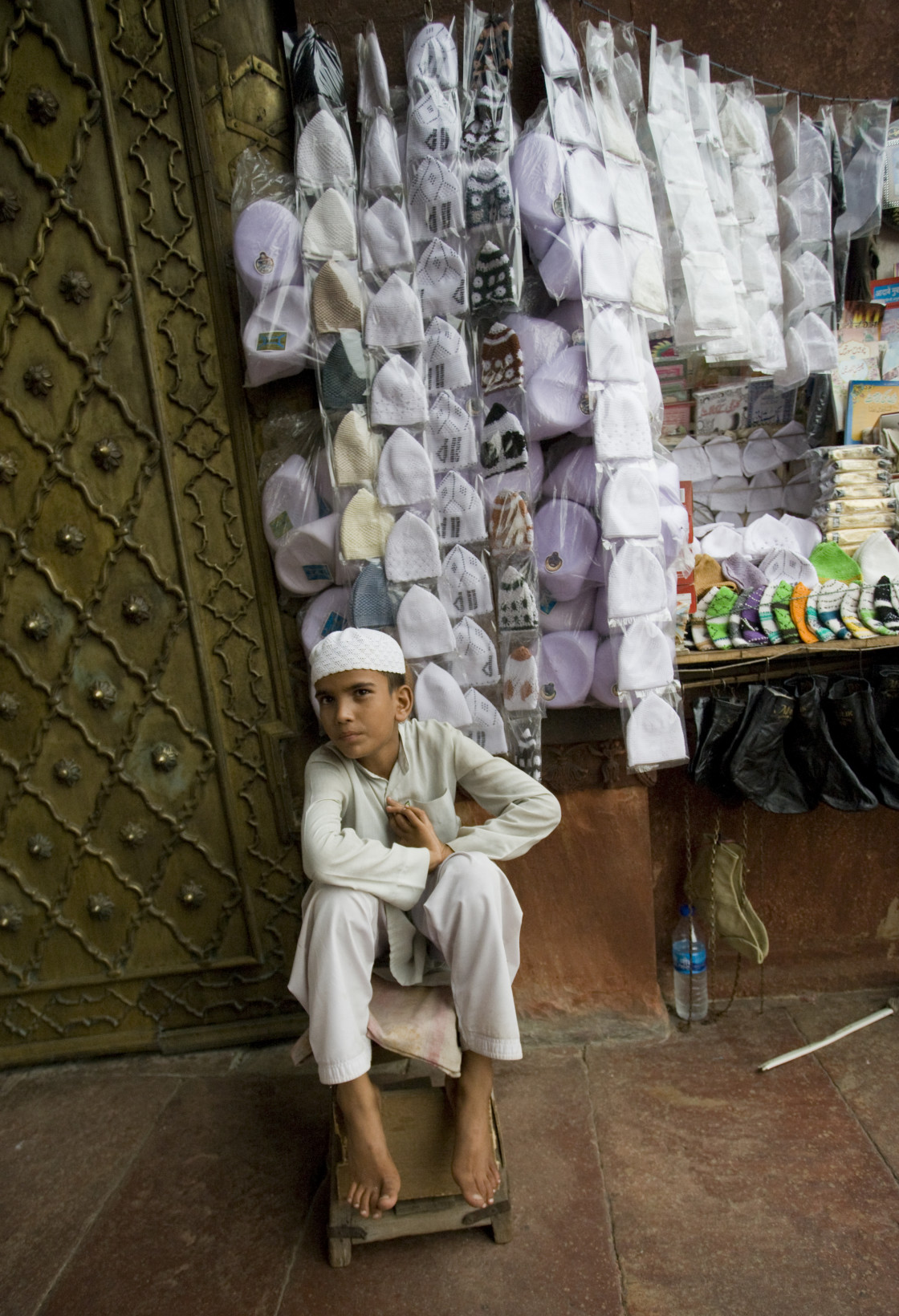 "Boy selling hats, Old Delhi_G3T7386" stock image