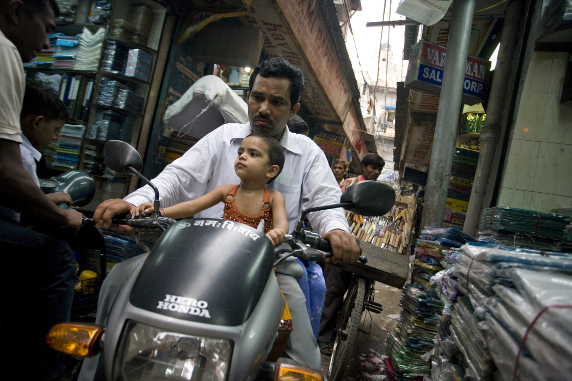 "Man and child on motorcyle, Old Delhi_G3T7364" stock image