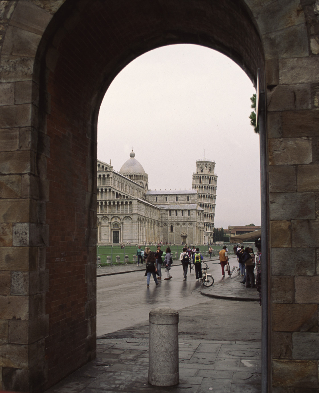 "Tower of Pisa through archway, Pisa, Italy" stock image