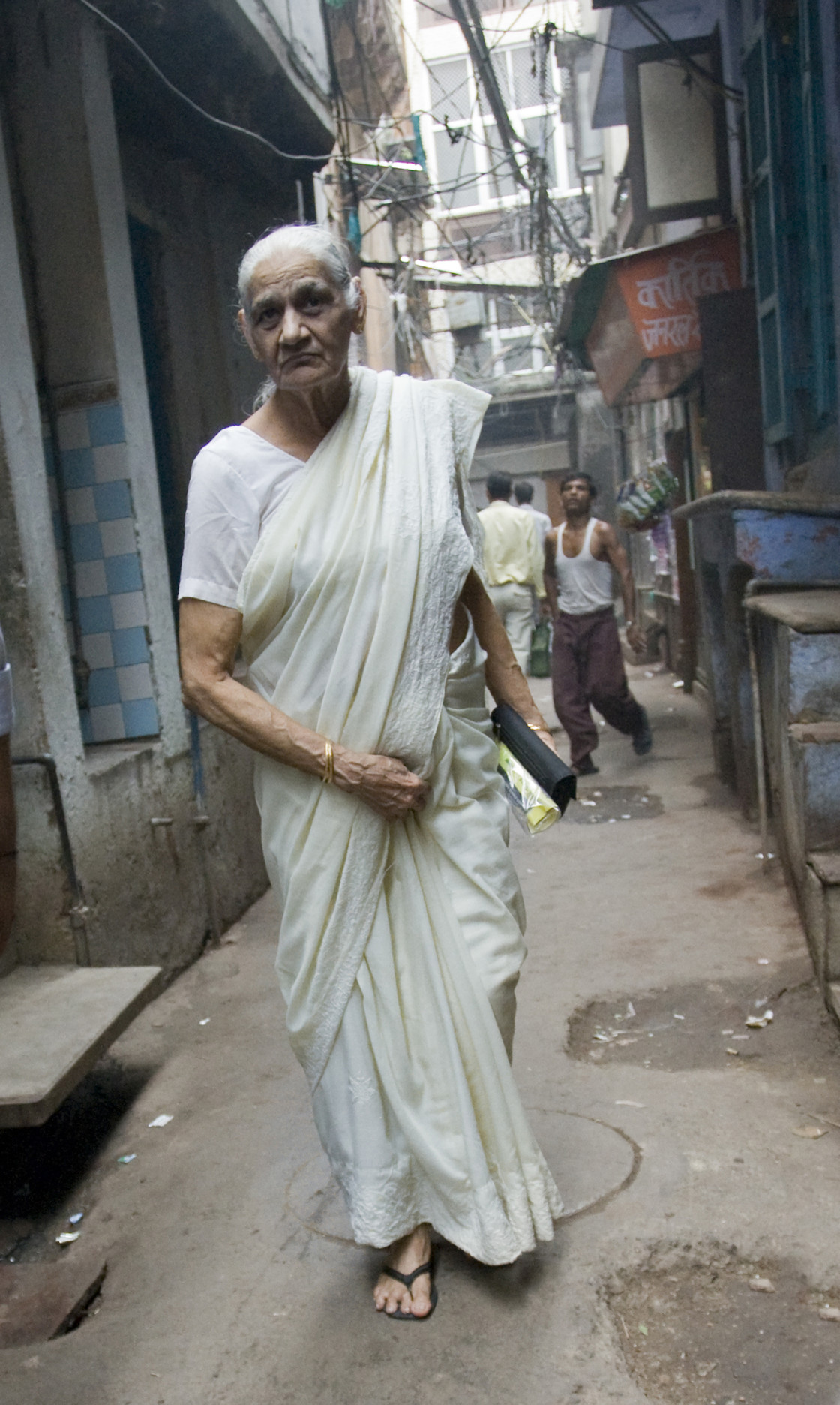 "Woman in white, Old Delhi, India_G3T7354" stock image