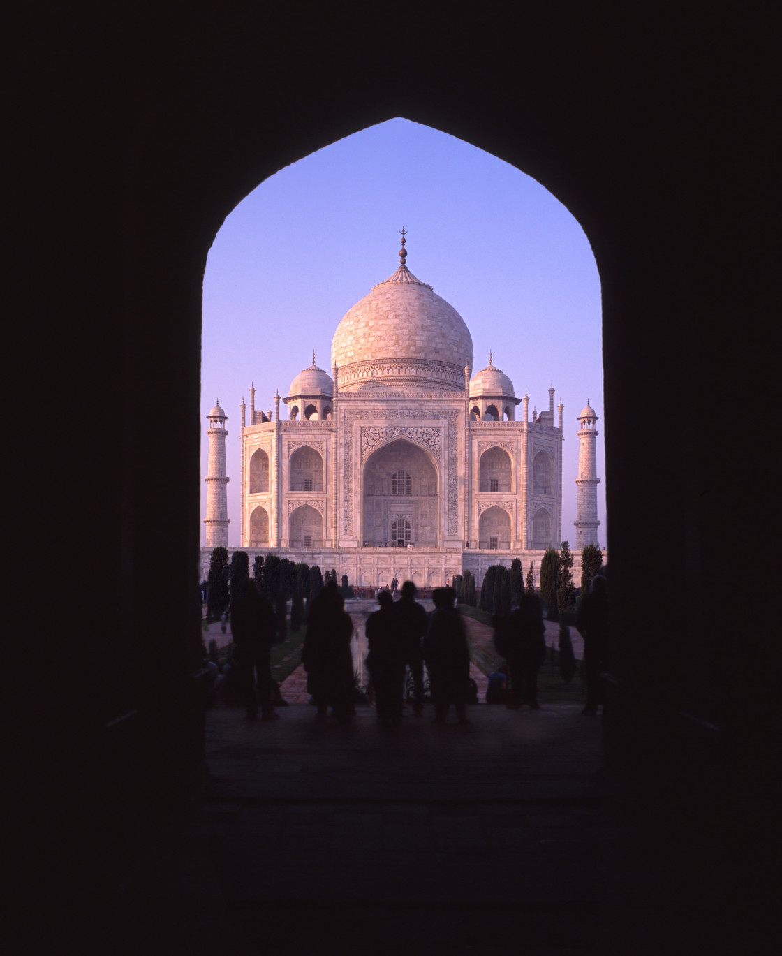 "Taj Mahal through archway" stock image