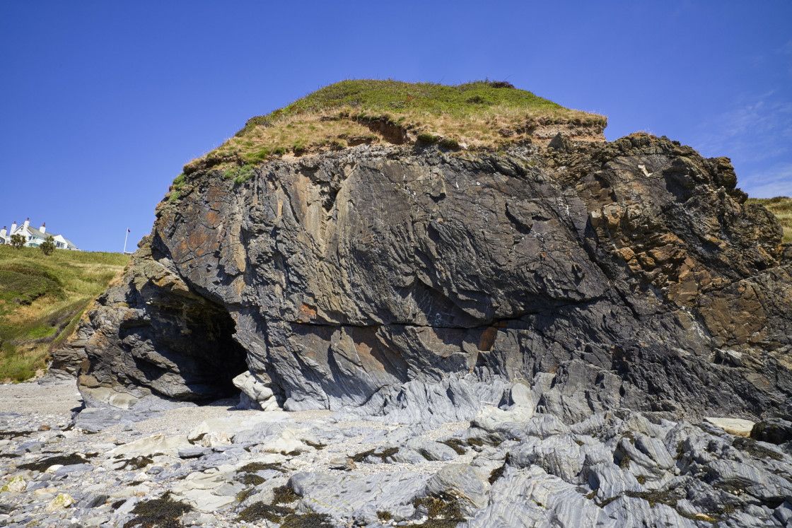 "A cave on the beach" stock image