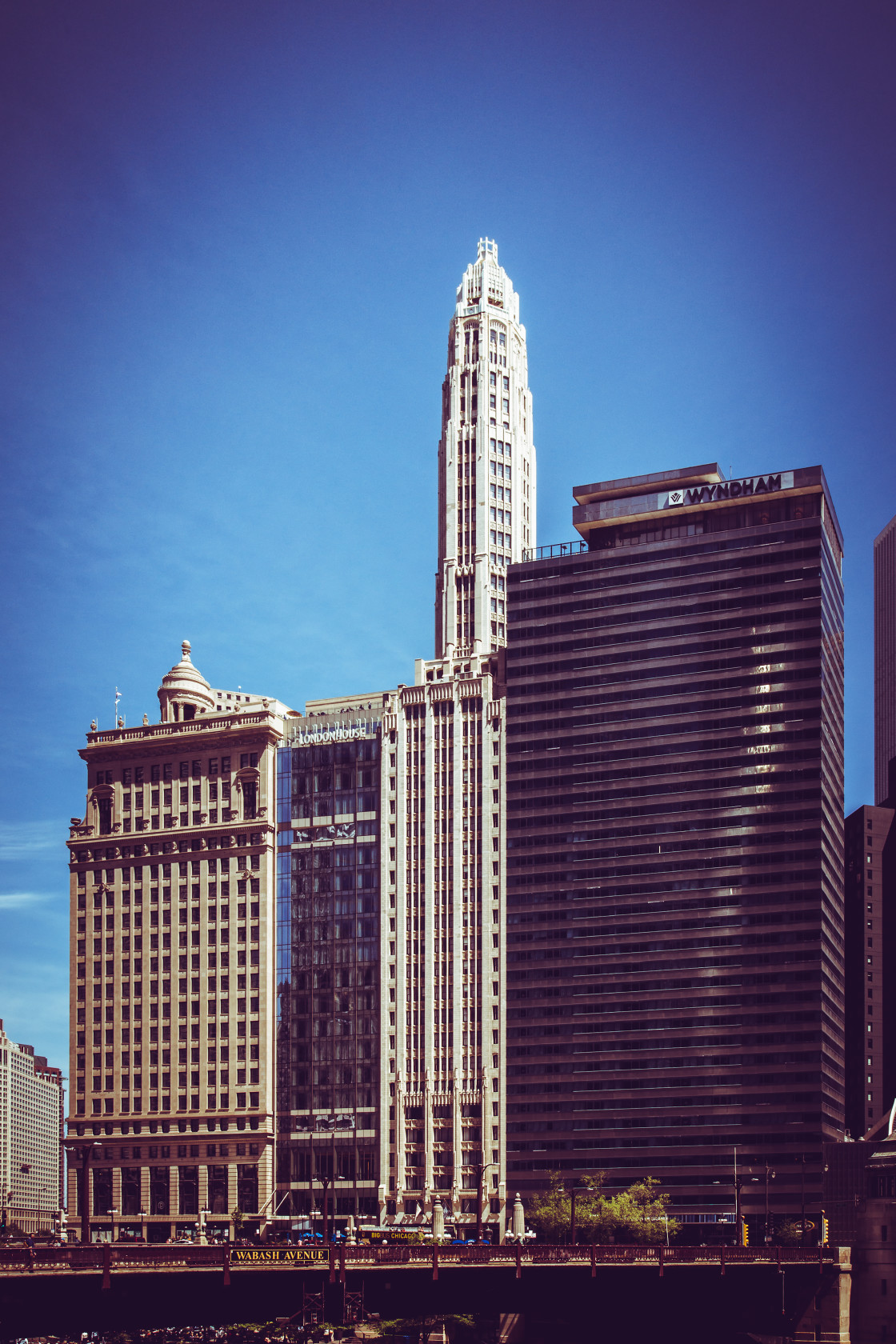 "Chicago, Illinois, USA, 20 May 2018. A stylised view of skyscrapers in Downtown Chicago, that were constructed during different periods and architectural styles, located on E. Wacker Drive." stock image