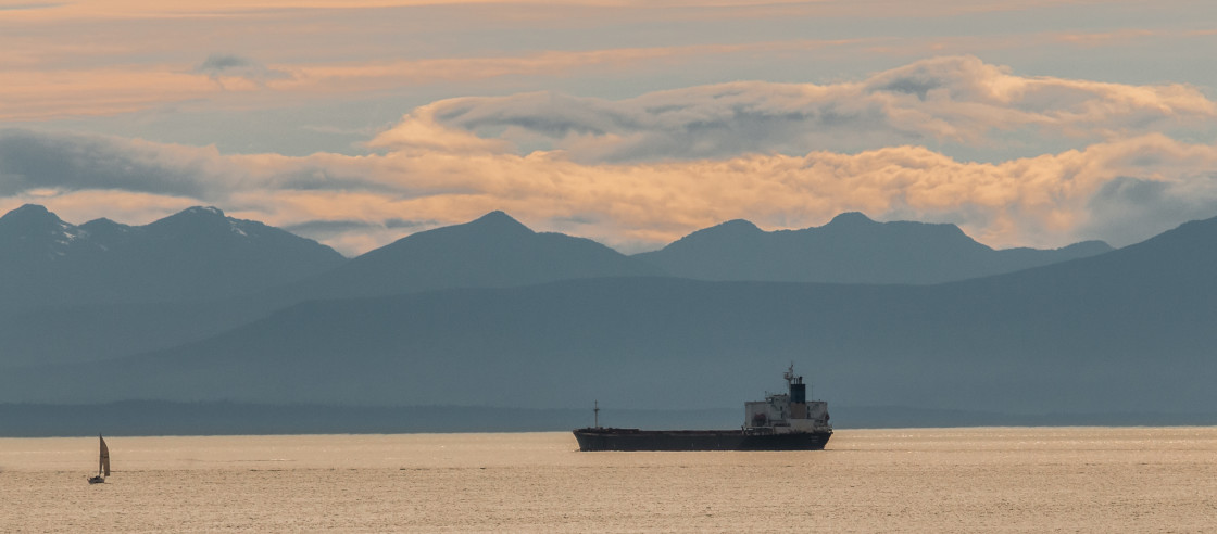 "Ship and sailboat with moutains" stock image