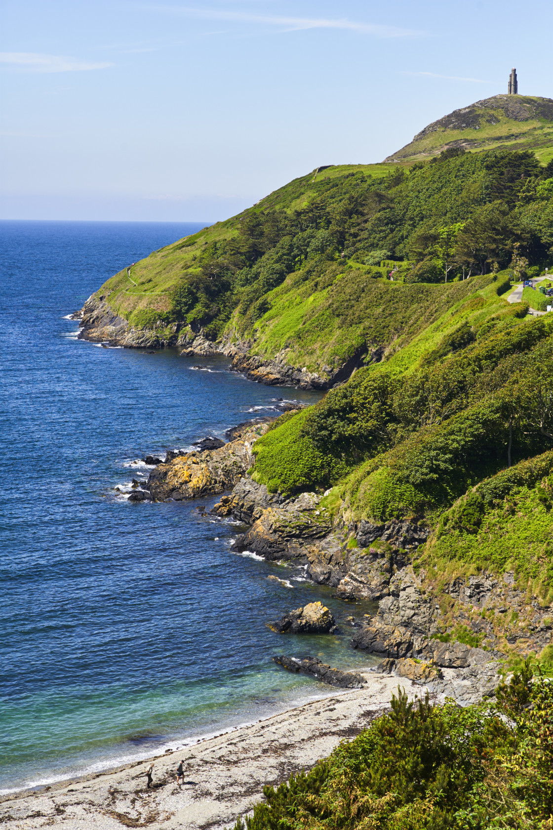 "An older couple explore a deserted cove" stock image