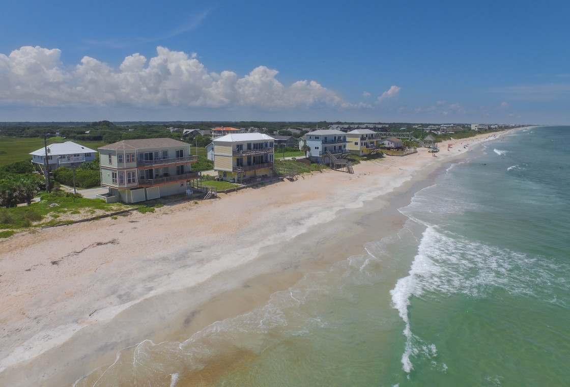 "Aerial beach and houses" stock image