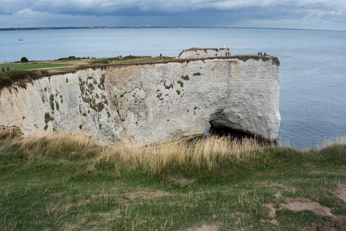 "White chalk Promontory with Arch" by Gordon England - $12.62 "White chalk Promontory with Arch" stock image