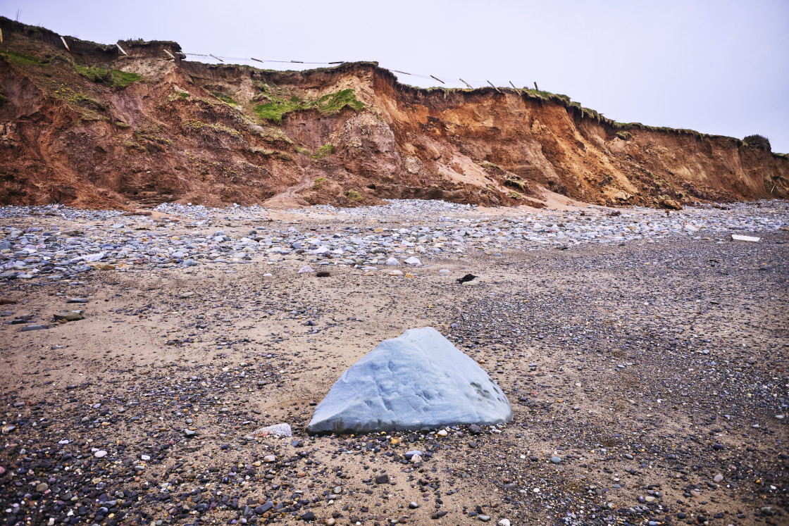 "A beach rock self isolating" stock image