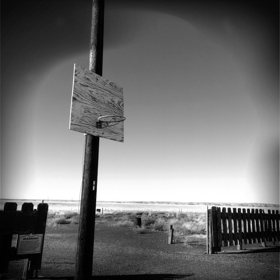 "An abandoned basketball hoop on the Navajo Nation in Arizona." by Xomiele - £26.12 "An abandoned basketball hoop on the Navajo Nation in Arizona." stock image
