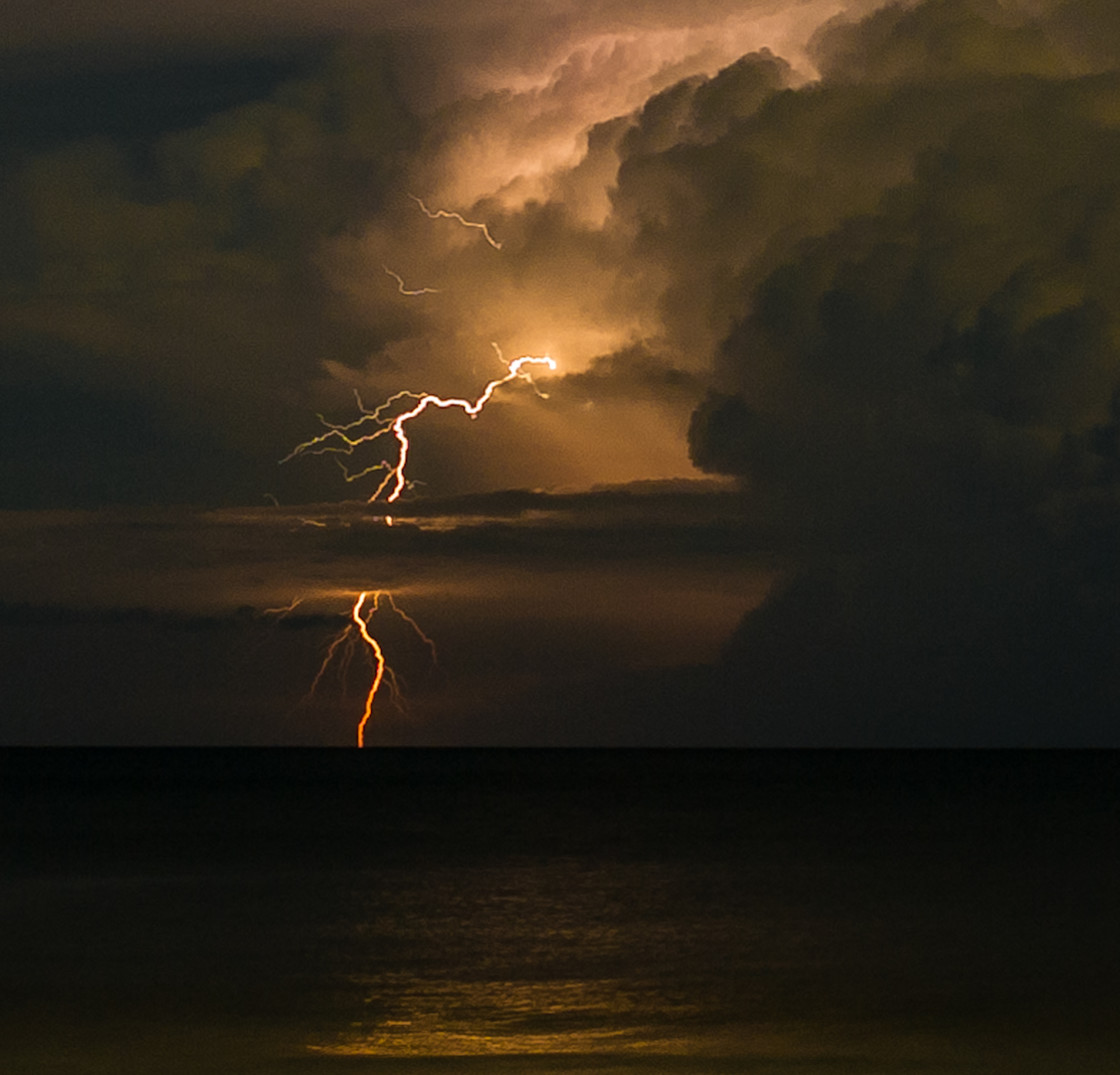 "Lightning at sea" stock image