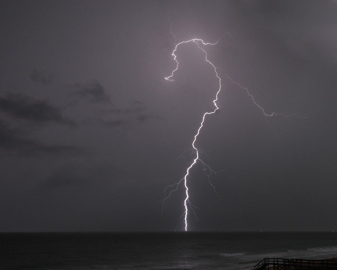 "Lightning at sea" stock image