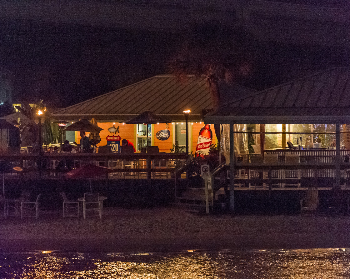 "Beach bar at night" stock image