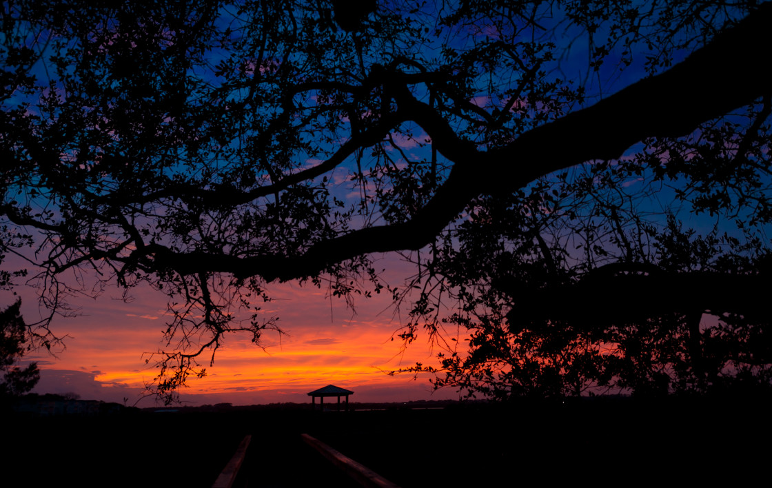 "Silhouette of pagoda at sunset" stock image