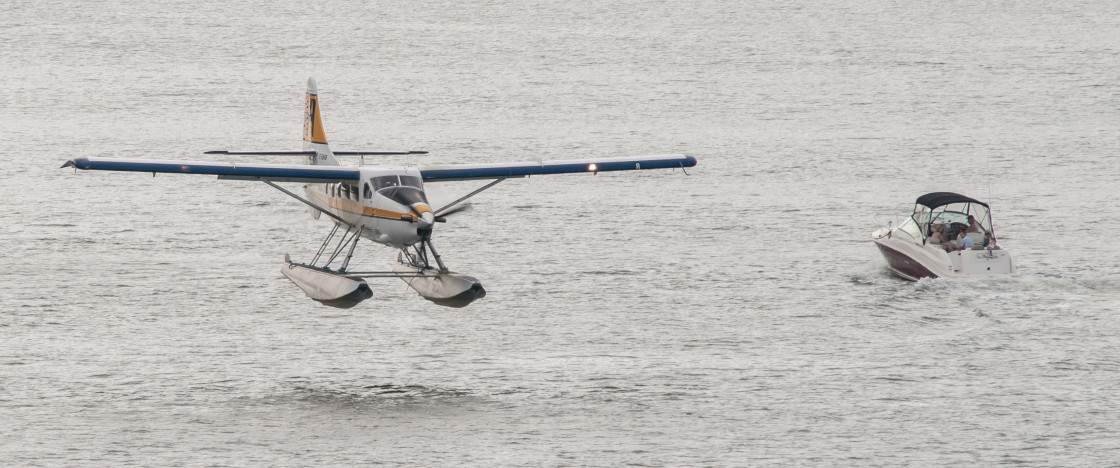 "Seaplane and boat" stock image