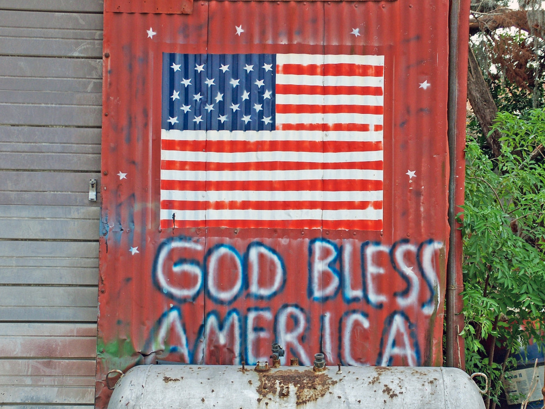 "American flag painted on a building" stock image