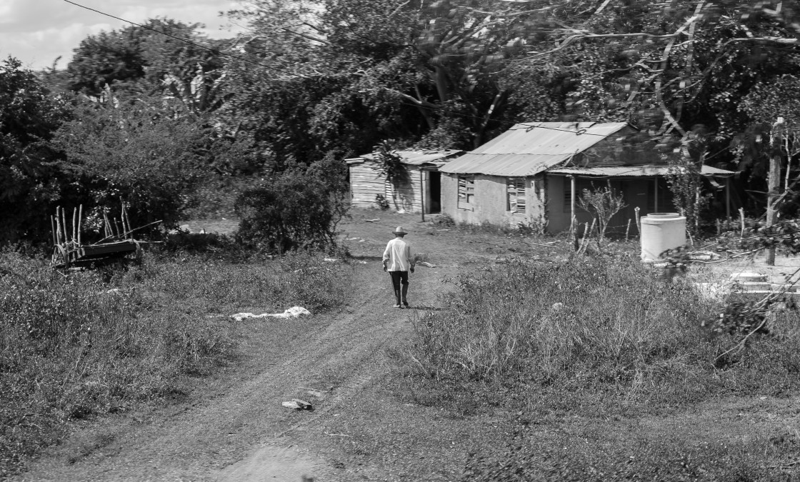 "Lone man walking to his house" stock image