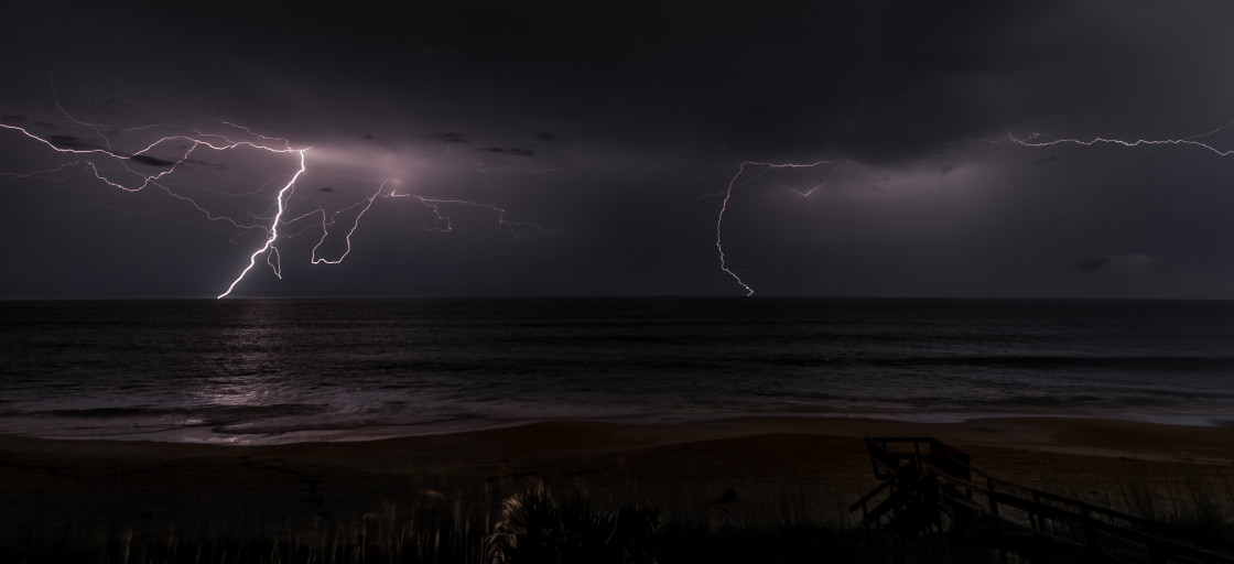 "Lightning storm at sea" stock image