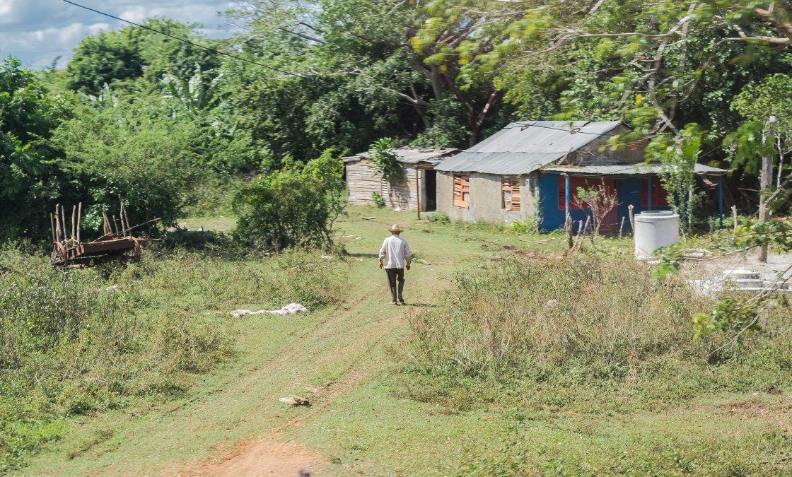 "Lone man walking to his house" stock image